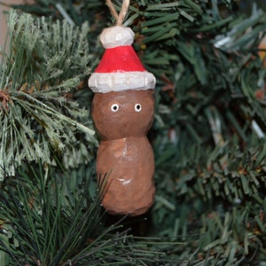 Poop Santa hand carved ornament
