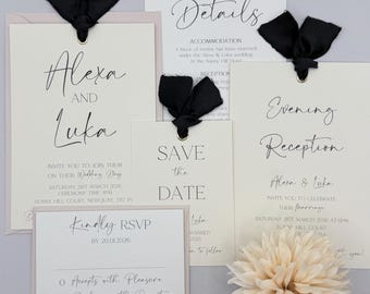 Invitación de boda neutra con lazo negro – Papelería moderna y elegante