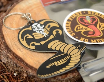 Cobra Kai electronic keychain with LED