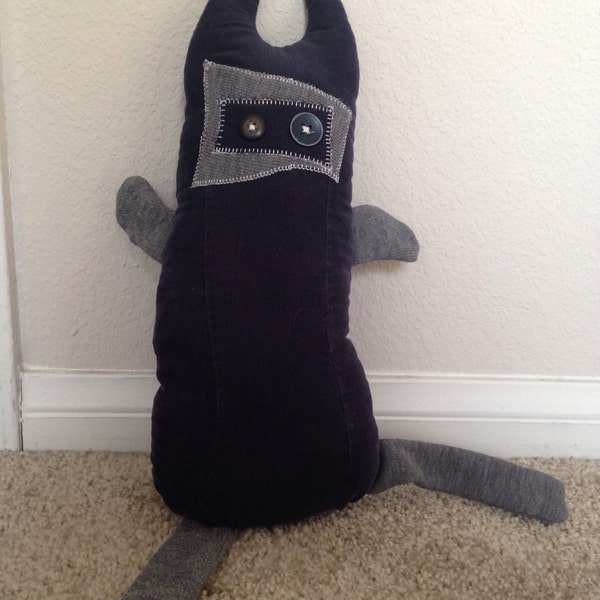 Plush whimsical monster, 18 inches from horn to toe.