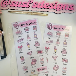 May include: A set of three ceramic mugs with a speckled, matte finish. The mugs are in shades of cream, light brown, and dark brown. Each mug has a simple, minimalist design and a rounded handle.