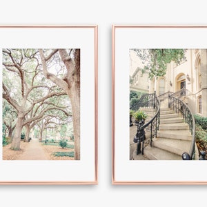 May include: Two framed photographs of a Southern city. The first photo shows a tree-lined walkway with a brick path. The second photo shows a white building with a grand staircase and black wrought iron railings.