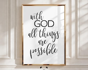 Op de afbeelding: Een ingelijste print met de tekst "with GOD all things are possible" in zwart schrift op een witte achtergrond. De lijst is goudkleurig en de print wordt op een witte muur getoond.