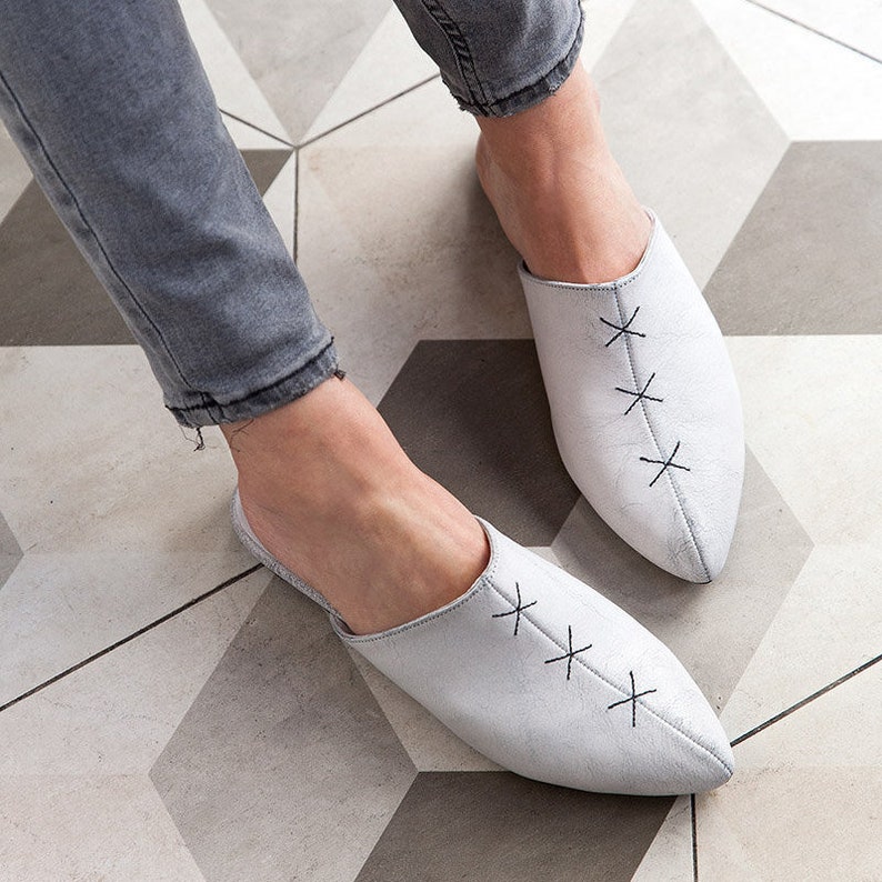 white flat mule shoes