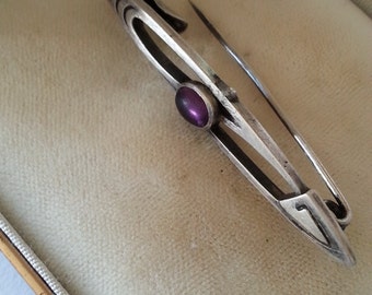 Early Art Deco Silver & Amethyst Glass Brooch.