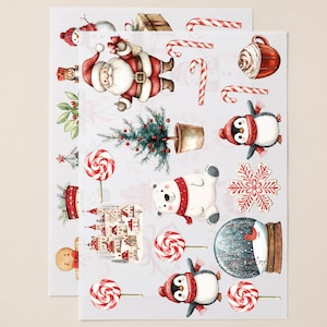 Könnte beinhalten: Ein Stickerbogen mit Aquarellillustrationen zu weihnachtlichen Themen, darunter der Weihnachtsmann, ein Pinguin, ein Eisbär, ein Lebkuchenmann, Zuckerstangen, Lollis, eine Schneekugel, ein kleiner Tannenbaum, ein Schneeflockenkeks und ein Dorf.