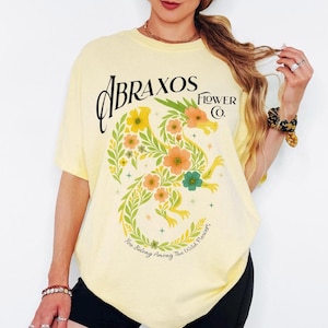 Chemise à fleurs Abraxos, T-shirt floral Abraxos, T-shirt dragon fantastique, Merch trône de verre, Chemise Manon Blackbeak, Les treize, Cadeau livresques