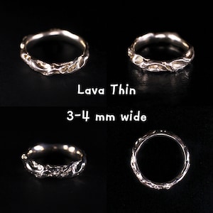 Variation photo collage that opens when the Lava Thin option is selected, showing the handmade cast sterling silver ring from four angles on a black background: two front views, an angled side view, and a top view. The on-image labels read “Lava Thin” and “3–4 mm wide.” The slim band has an uneven wavy outline, irregular lava relief texture, polished highlights, and a fluid abstract freeform shape, revealing the unique surface details around the full solid 925 silver ring.