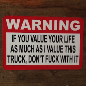 Warning, If you value your life as much as I value this Truck, Don't fuck with it Sticker by Seven 13 Productions