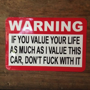 Warning, If you value your life as much as I value this Car, Don't fuck with it Sticker by Seven 13 Productions