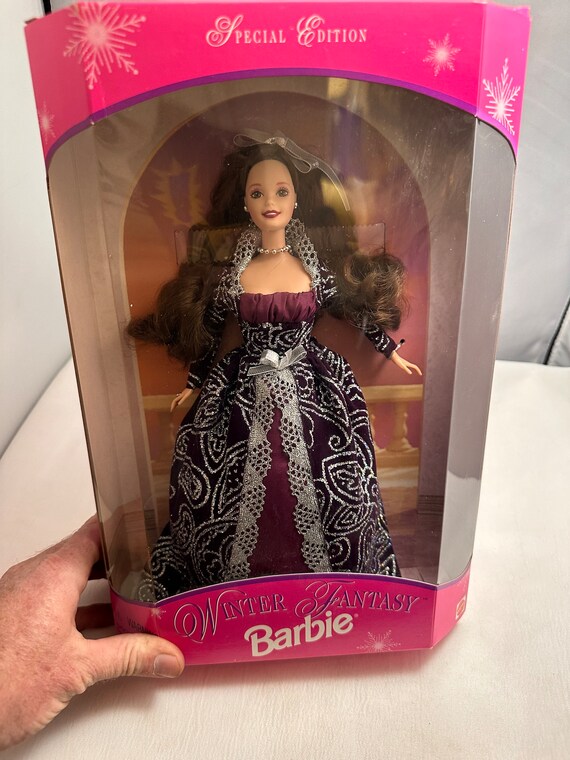 Collectible barbie dolls value best sale