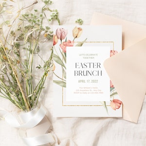 May include: A white card with a gold border and a floral design featuring pink and yellow tulips. The text on the card reads "Let's Celebrate Together Easter Brunch April 17, 2022 The Williams Home 123 Anywhere St., Any City RSVP to Cathy at 123-456-7890"