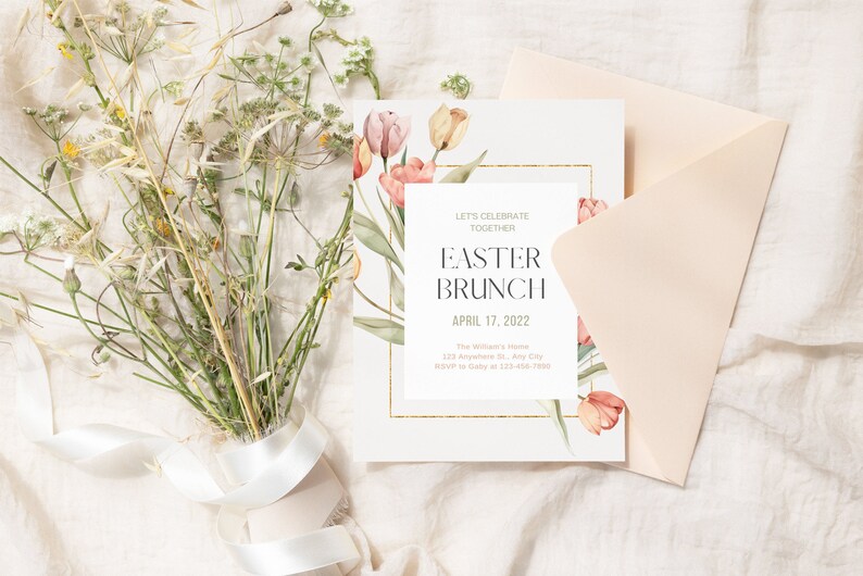 May include: A white card with a gold border and a floral design featuring pink and yellow tulips. The text on the card reads "Let's Celebrate Together Easter Brunch April 17, 2022 The Williams Home 123 Anywhere St., Any City RSVP to Cathy at 123-456-7890"