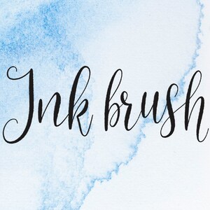 May include: Ink brush calligraphy on a light blue watercolor background. The text reads "Ink brush".