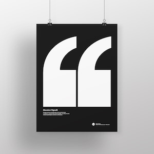 May include: Black and white poster with large white quotation marks on a black background. The text "Massimo Vignelli" is at the bottom of the poster with the text "Design should be conceptually correct, aesthetically satisfying, functionally sound, and culturally relevant.  It should be a source of delight."  The poster is hanging from two clips.