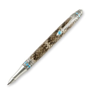 May include: A silver and turquoise pen with a snakeskin pattern. The pen has a decorative cap with a turquoise stone and a silver band with turquoise stones.