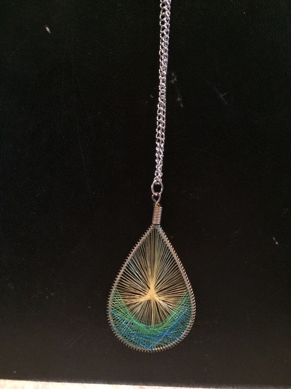 god's eye necklace