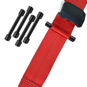May include: A close-up of a red seat belt with a black buckle and four black metal rods. The seat belt is made of a woven material and has a black plastic buckle. The rods are cylindrical with a wider end on each side.