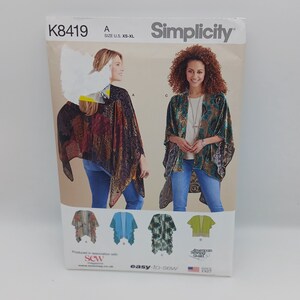 May include: Simplicity sewing pattern K8419 for a kimono with three different fabric options. The pattern is for sizes XS-XL and is easy to sew.