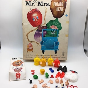 May include: A vintage Hasbro Mr. & Mrs. Potato Head toy set including a rectangular cardboard box with a colorful illustration, a paper instruction manual, and various plastic body parts, accessories, and small figures in yellow, red, blue, and black.