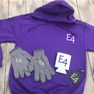 May include: A purple hoodie with a white "E4" logo on the front. The hoodie is paired with a set of gray gloves, a white can cooler with a white "E4" logo, and a black keychain with a white "E4" logo.