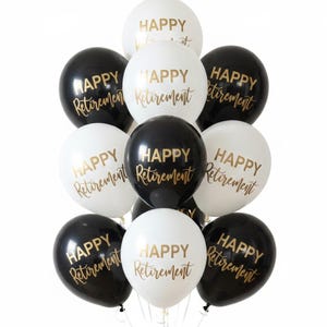 Black and White Balloons that read Happy Retirement in a gold metallic font.  Retirement Balloon Centerpiece