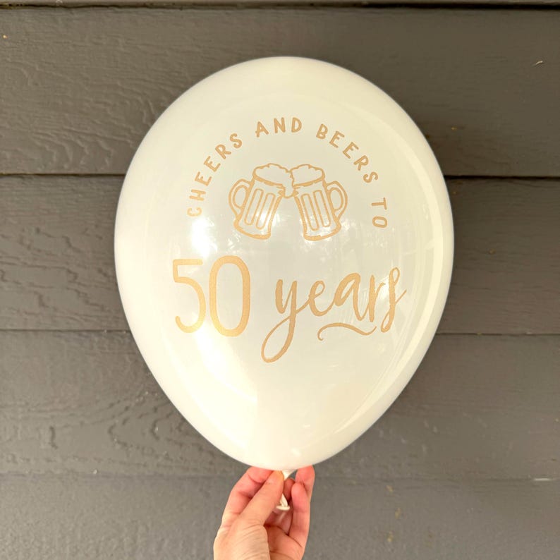 latex white and gold balloon that reads cheers and beers to 50 years.  50th Birthday Balloons