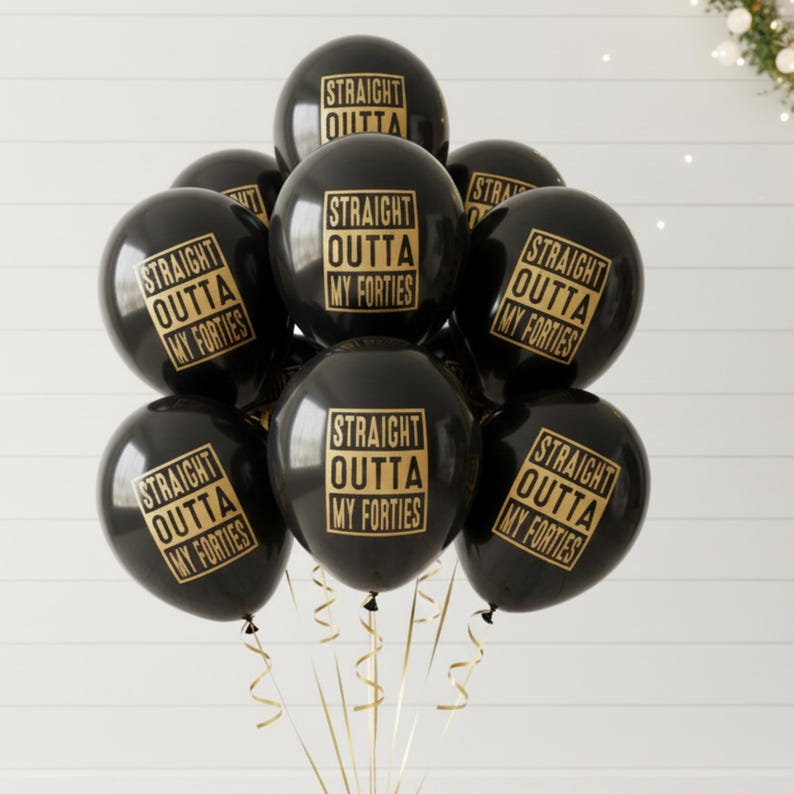Black latex balloon with gold text that reads Straight outta my forties.  50th Birthday Balloons for a man