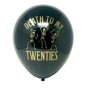 Black latex balloon that reads Death to my 20's in gold text with dancing skeletons.  30th Birthday Balloon black and gold