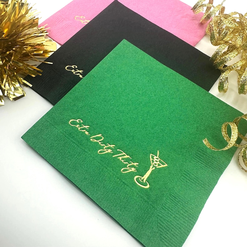 Green cocktail napkins with gold foil lettering that reads "Extra Dirty Thirty" and a martini glass graphic.   30th Birthday Party Decorations
