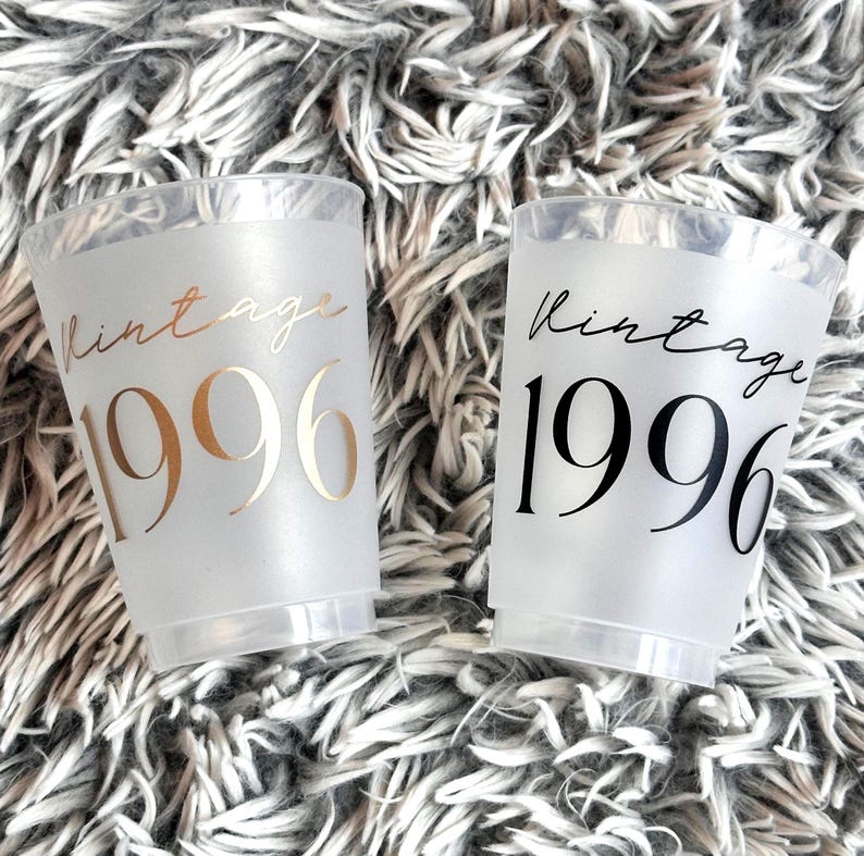 Frosted 16 ounce plastic cups that read Vintage 1996 in a black and gold text.  30th Birthday Cups