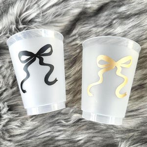 Coquette Bow Themed Frosted Cups 16oz | Reusable Bachelorette, Birthday, Bridal Shower Party Cups | Black & Gold Bow Design | Set of 8