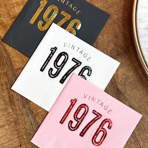 Cocktail Napkins that read Vintage 1976 in various color foils.  50th Birthday Cocktail Napkins