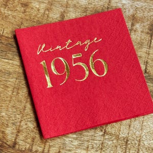 Vintage 1956 gold foil cocktail napkins for elegant birthday party tables