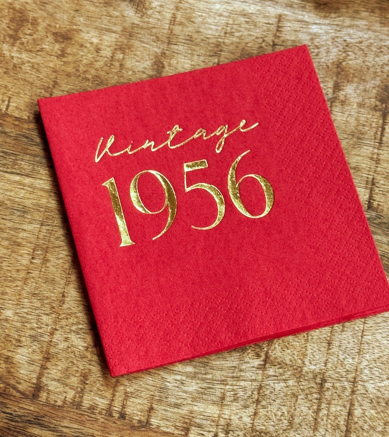 Vintage 1956 gold foil cocktail napkins for elegant birthday party tables