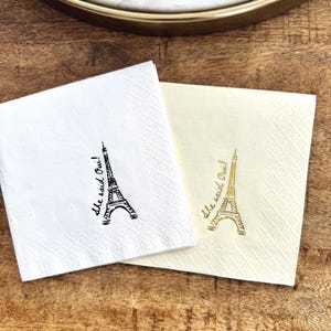 Parisian bridal shower napkin reading “She Said Oui” with Eiffel Tower graphic