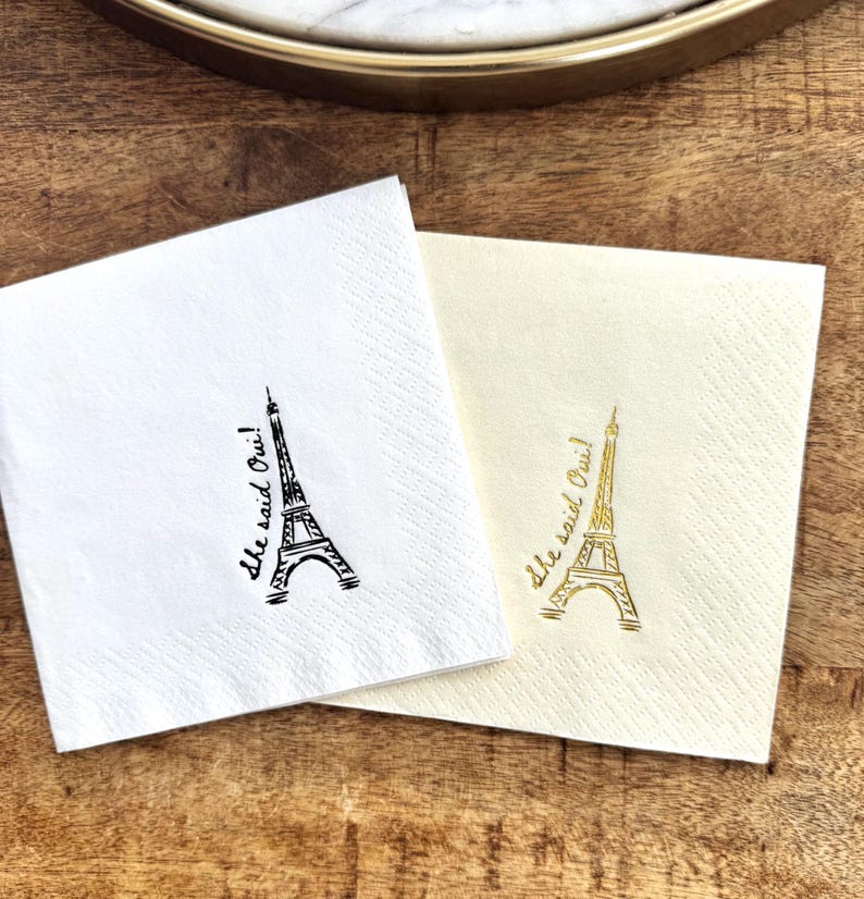 Parisian bridal shower napkin reading “She Said Oui” with Eiffel Tower graphic