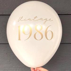 White Latex Balloon that reads Vintage 1986 in gold text.  40th Birthday Balloon