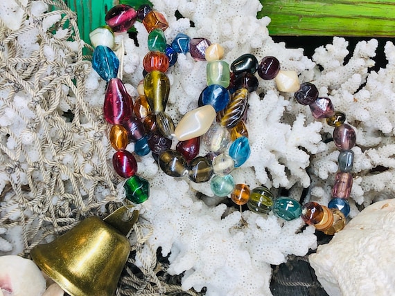 multicolored glass beads with bell multicolored glass beads with bell