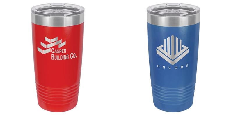 May include: Two insulated tumblers, one red and one blue, with silver rims and lids. The red tumbler features the text "Casper Building Co." and a brick design. The blue tumbler has the text "Encore" and a geometric logo.