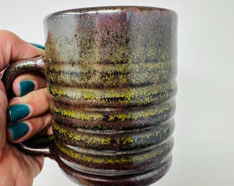 Reduction fired tea dust ripple mugs by Raquel Muslin