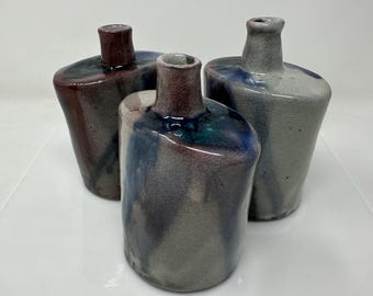Salt fired bottles by Raquel