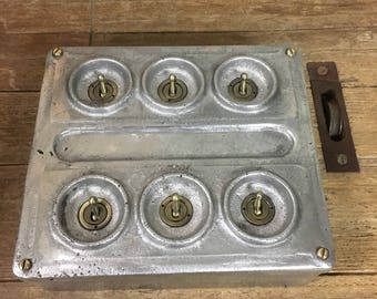 Vintage industrial style toggle light switch in cast metal