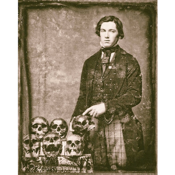 Creepy vintage photo print victorian man with skulls,  gothic wall decor dark art macabre weird strange unusual antique photograph 1800s