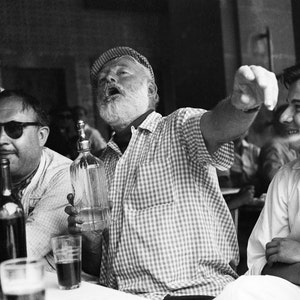 Ernest Hemingway drinking vintage photography print. Writer gift for author black and white drinking drunk in Key West bar wall decor poster