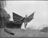 Man in wingsuit vintage photo print gift sky diver hang glider base jump flyer pilot wings weird strange unique wall poster black and white