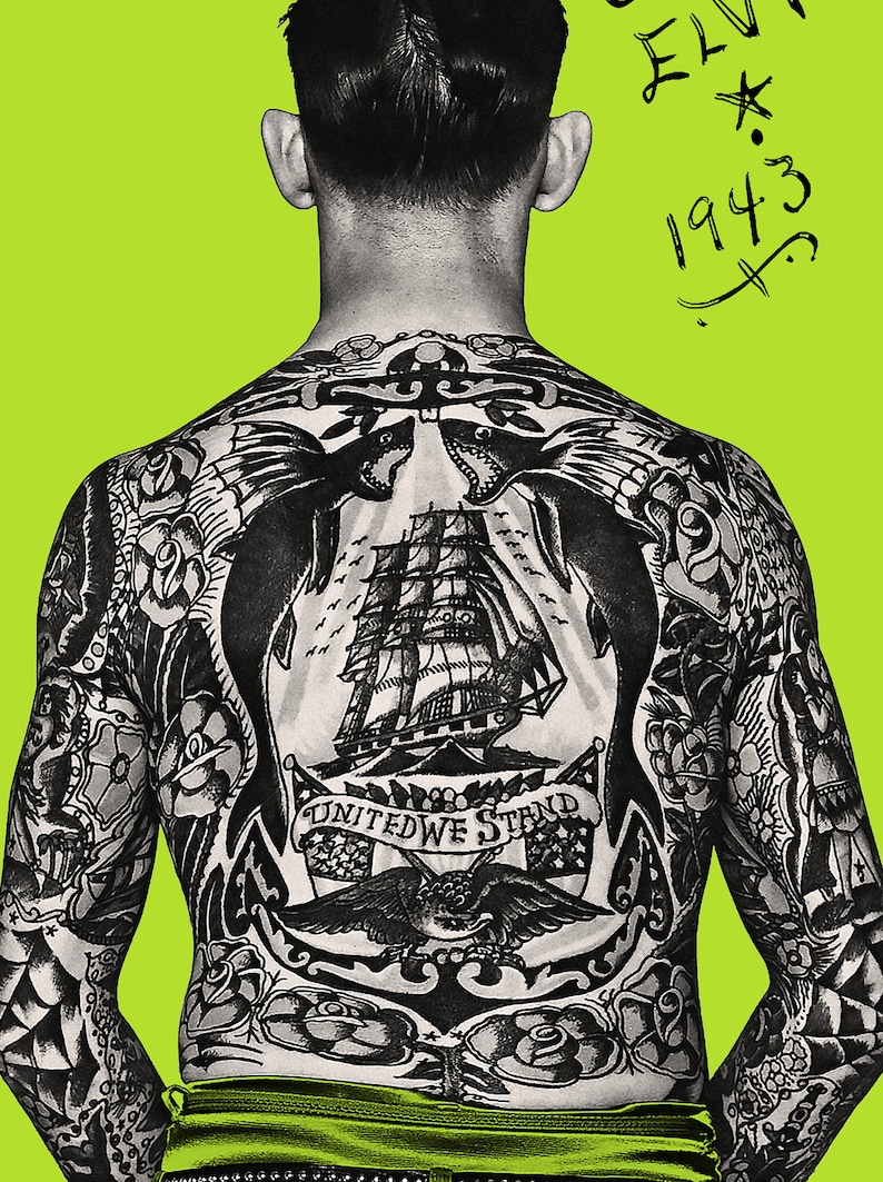 May include: A man with a full back tattoo. The tattoo features a ship, an eagle, and the words "United We Stand". The man's back is facing the camera. The background is a bright green color. The text "ELVIS * 1943" is written in black on the upper right corner of the image.