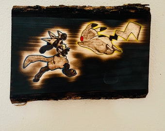 Pikachu vs. lucario hand burned wood art decor