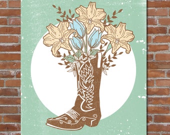May include: A brown cowboy boot with a floral arrangement of yellow and blue flowers inside. The boot is on a white circle with a light green background.
