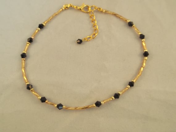 Black and gold anklet deals